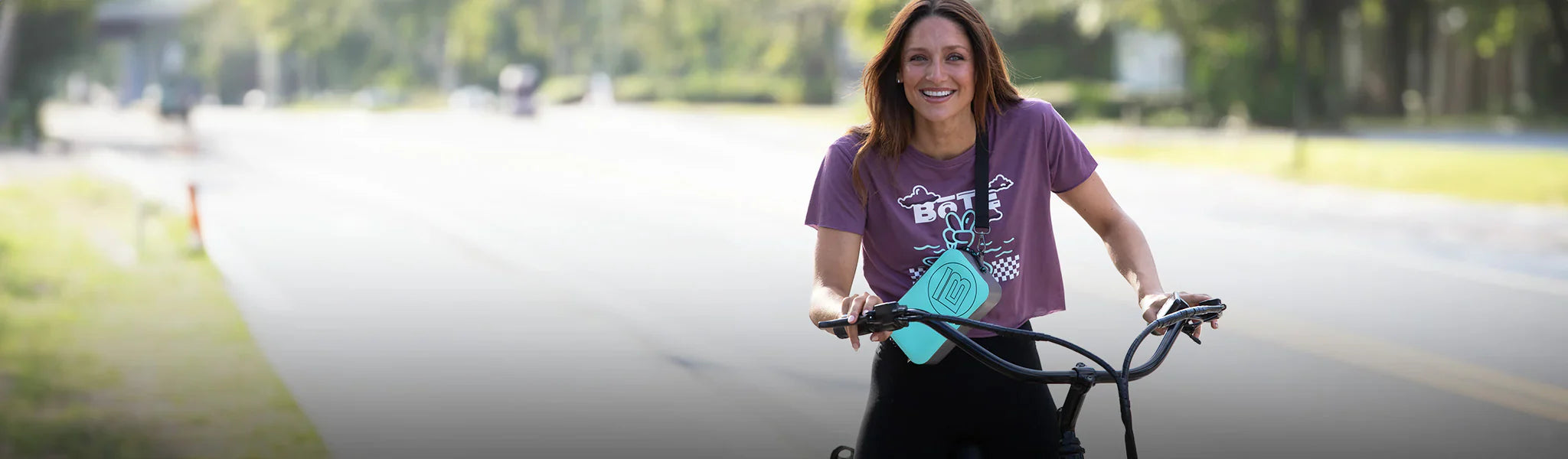 Lady on bike with belt and pack