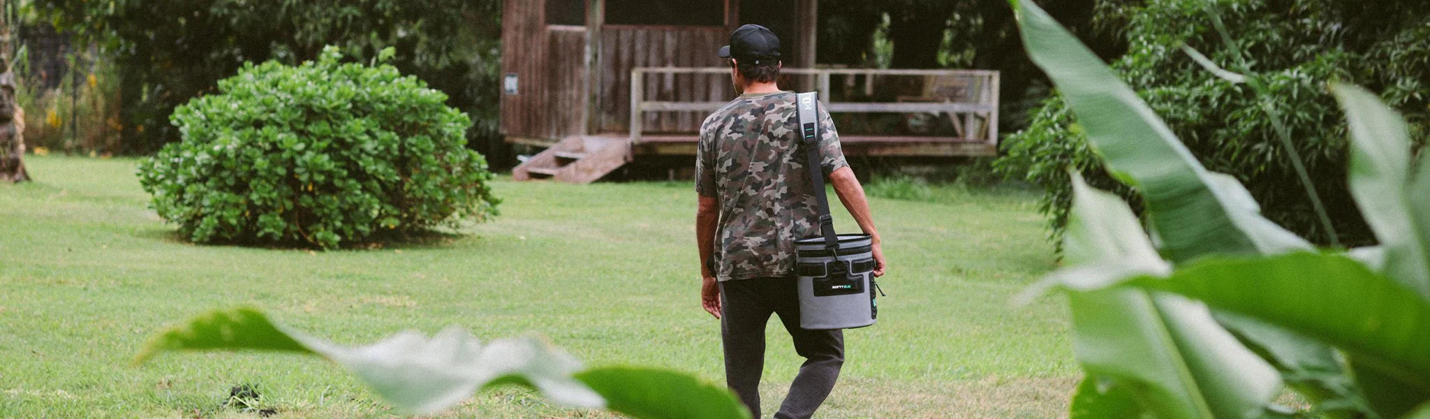 BOTE soft cooler on shoulder of person walking