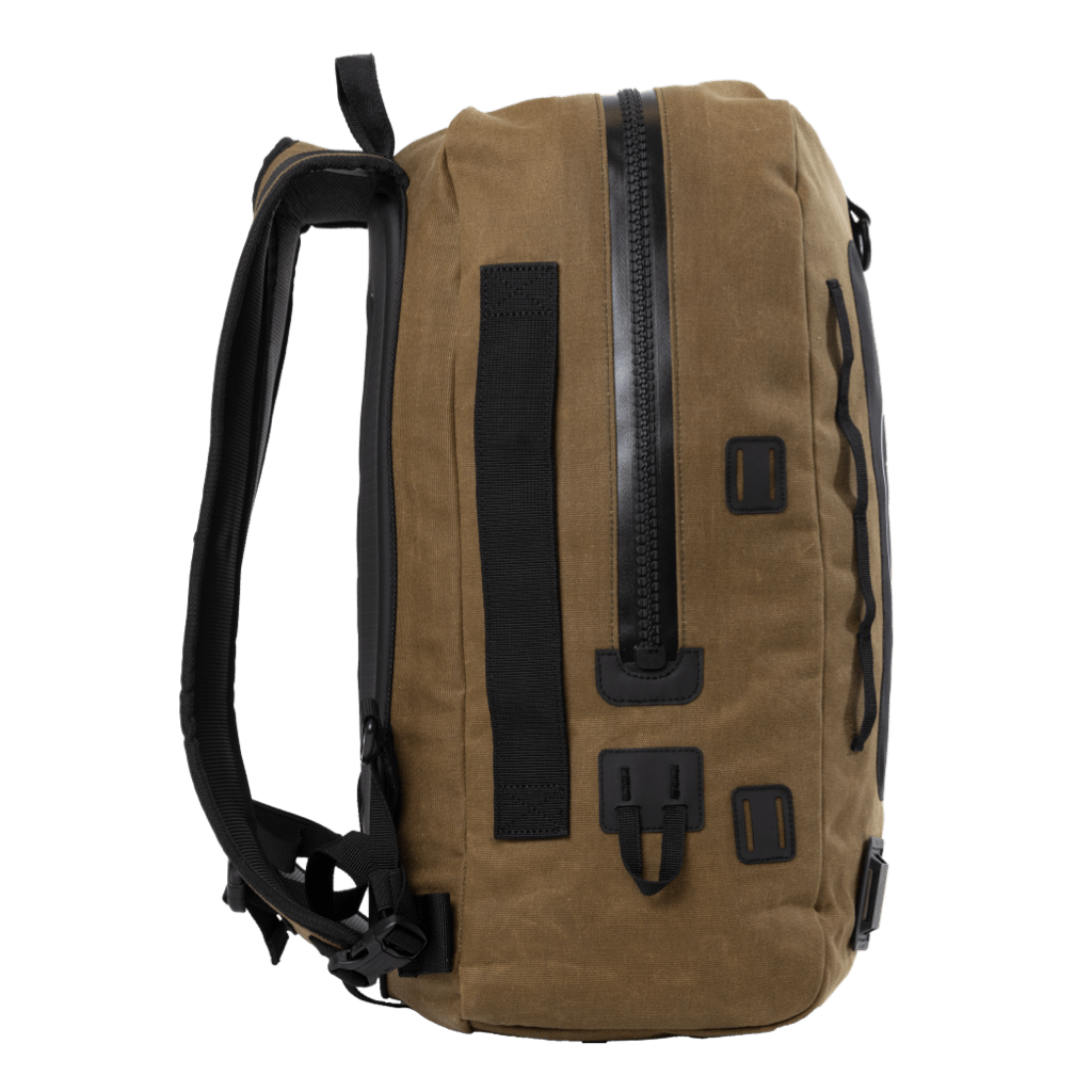 Opposite side view of Highwater Backpack Last Cowboy highlighting zipper and webbing loops.