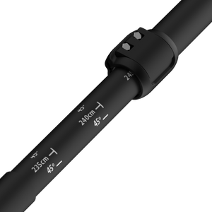 Black metal rod with measurement markings on a white background