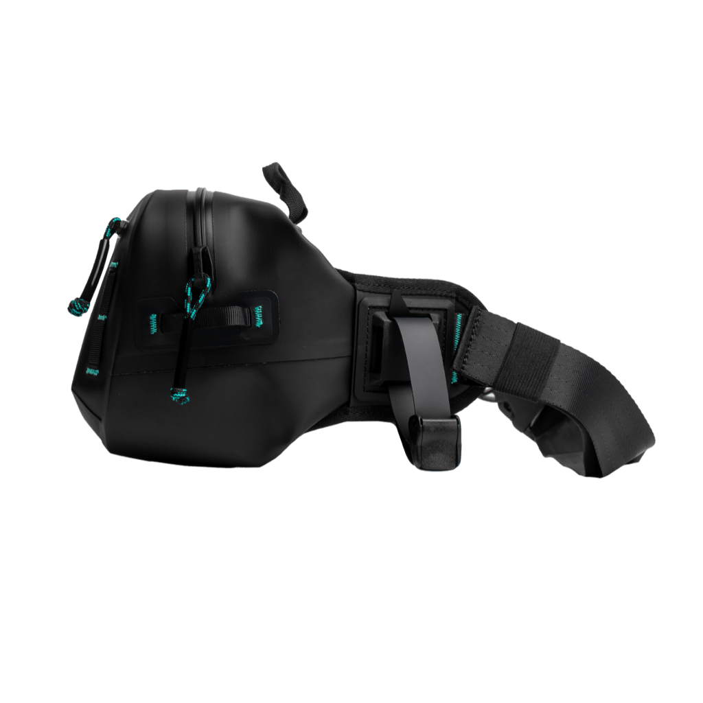 Side view of black Highwater Belt Pack showing zipper pulls and adjustable padded waist strap.