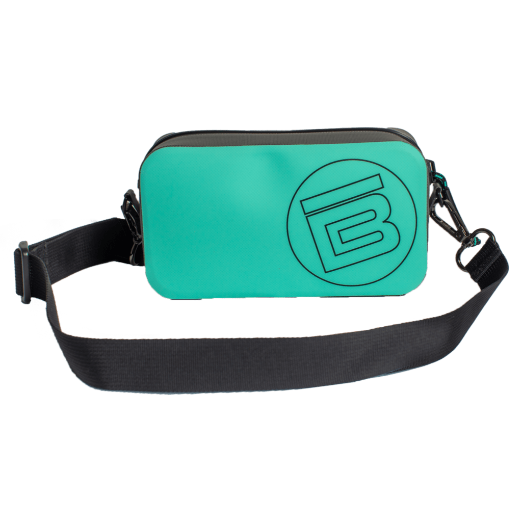 Angled view of Highwater Hitchhiker Seafoam bag with black strap and bold BOTE logo.