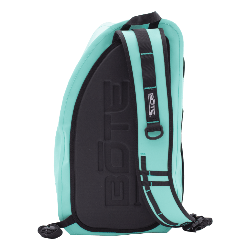 Rear view showing padded black back panel and shoulder strap on the Highwater Slingpack Seafoam.