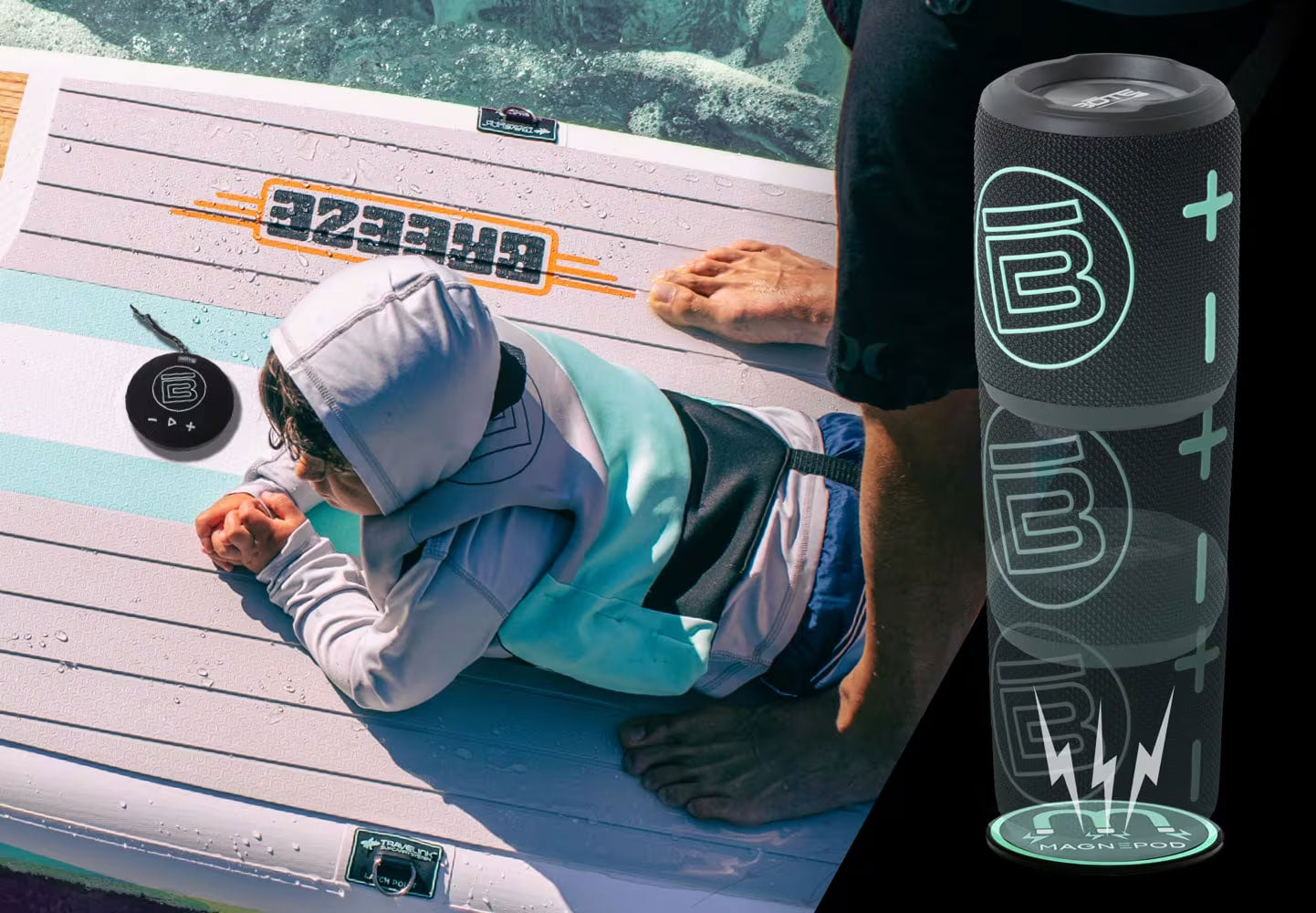 Person lying on a paddleboard with a Bluetooth speaker next to them